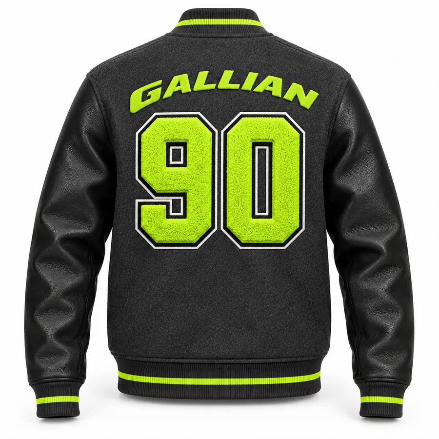 Back of charcoal and black varsity jacket with arched lime lettering and large chenille 90