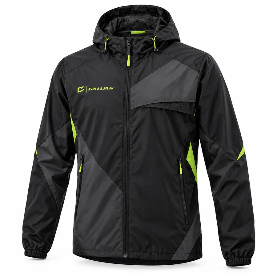 Black Volt Travel Windbreaker with hood, black ripstop shell, charcoal angular chest and sleeve panels and volt zip pulls