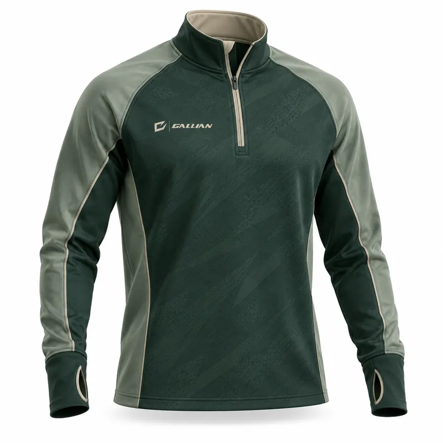 Forest Stone half-zip in forest green with tonal texture, sage raglan sleeves, stone collar lining and thumbhole cuffs